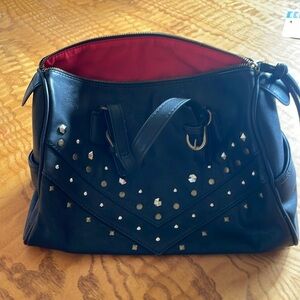 Carlos Santana purse